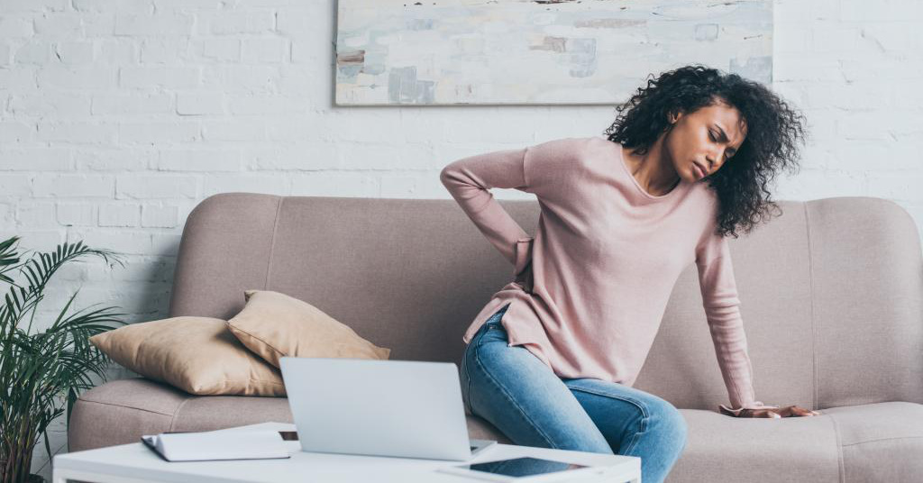 Woman with Back Pain - Best Mattress for Back Pain